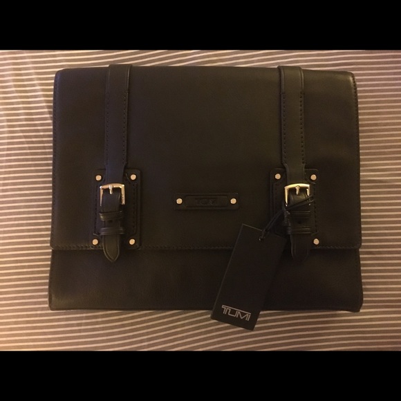 TUMI men’s buckle netbook clutch.